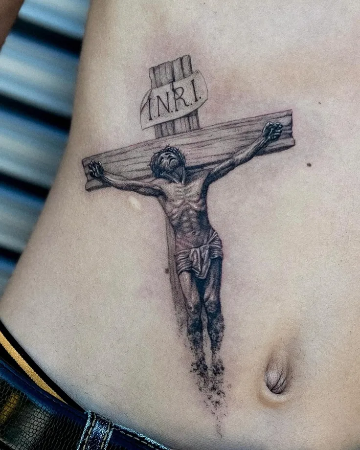 腹のタトゥー