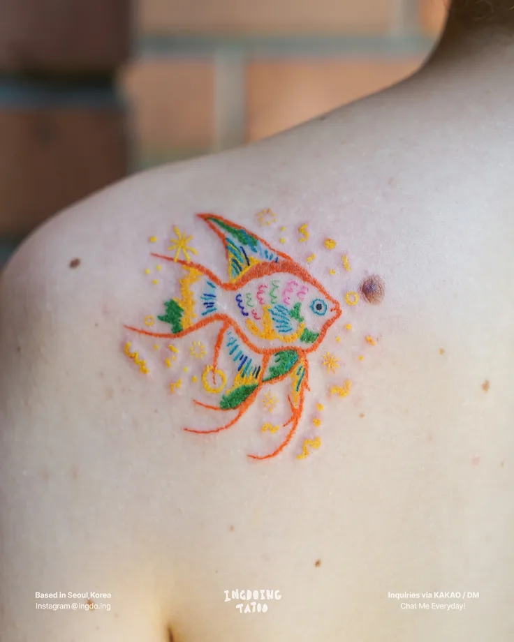 輝く魚のタトゥー